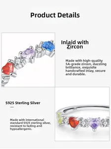 Macro shot of S925 sterling silver band with colorful heart-shaped 5A zircons and engravings