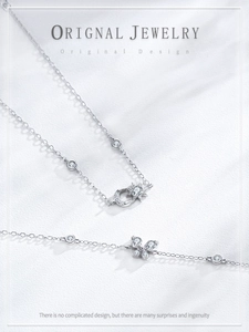 Detailed macro view of S925 silver bracelet featuring a delicate butterfly charm inlay