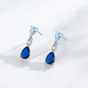 Vintage S925 silver earrings with gradient blue teardrop zircon stones in a vertical drop style