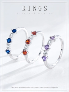 Detailed close-up showing S925 hallmark on colorful zircon sterling silver rings