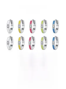 Macro display of colorful S925 sterling silver hoop earrings with cubic zirconia stones