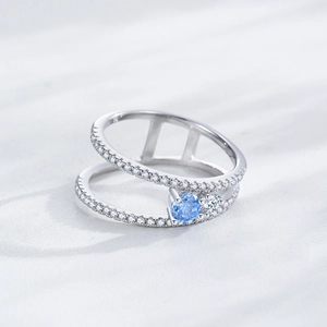Double layer S925 sterling silver ring featuring a round blue zircon and pavé setting