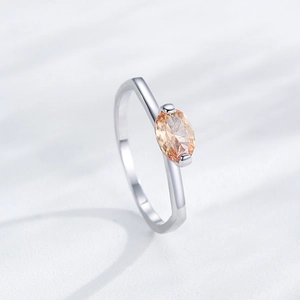Elegant S925 sterling silver ring featuring a champagne oval cubic zirconia gemstone
