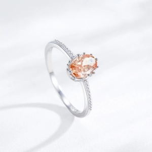 Elegant S925 silver ring featuring an oval champagne zircon with beaded metal band