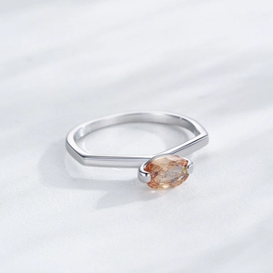 Elegant S925 silver ring featuring marquise champagne zircon with geometric design