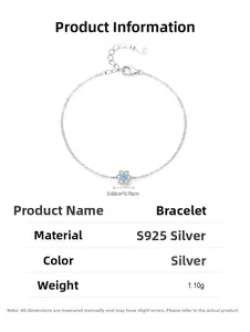 Detail of S925 sterling silver tag with flower pendant and blue gemstone