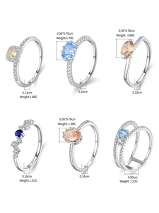 Detail of six S925 sterling silver rings with colorful geometric zircon gemstones