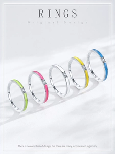 Detailed view of colorful S925 sterling silver rings with enamel and small crystals