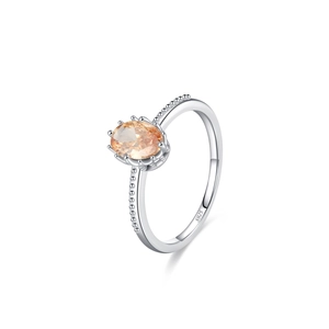 Elegant S925 sterling silver ring featuring a large oval champagne zircon in claw setting