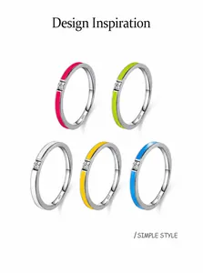 Detail of colorful enamel S925 sterling silver rings with small cubic zirconia accents