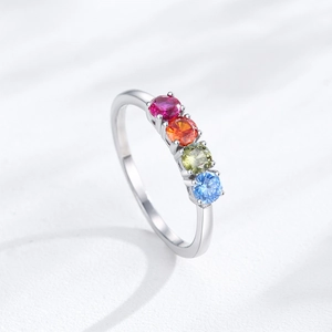 S925 sterling silver ring featuring four colorful round-cut rainbow zircon gemstones