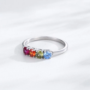 Minimalist S925 silver ring featuring four vibrant rainbow zircons in a sleek claw setting