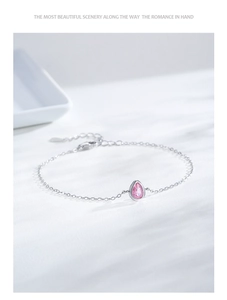 Detail of S925 silver bracelet featuring a pink pear-cut zircon and adjustable clasp