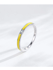 Detailed close-up of S925 sterling silver ring with yellow enamel and small zircon