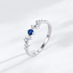 Elegant S925 sterling silver wave ring with blue sapphire and white zircon stones