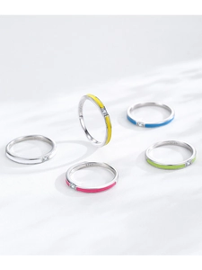 Close-up of S925 sterling silver colorful enamel rings with small cubic zirconia stones