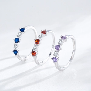 Elegant S925 sterling silver rings with colorful zircon stones in blue, red, and purple
