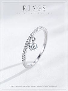 Detailed macro view of S925 silver ring featuring a sparkling round diamond pendant