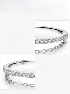 Macro detail of S925 sterling silver stamp and 5A cubic zirconia stones on double layer ring