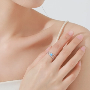 Elegant S925 silver double-layer ring with blue and clear zircon stones on finger
