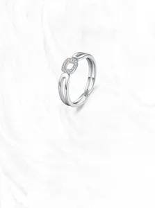Detailed macro view of S925 sterling silver double-layer ring with sparkling zircon inlays