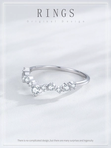 Macro shot of V-shaped S925 sterling silver ring with sparkling micro-pave crystals