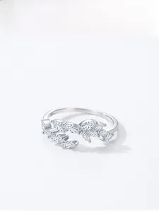 Macro shot of S925 sterling silver leaf ring with marquise-cut white zircon accents