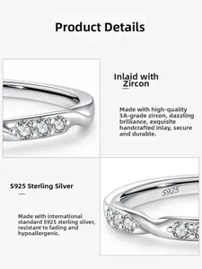 Macro shot of S925 sterling silver ring showing three inset zircons and S925 hallmark stamp