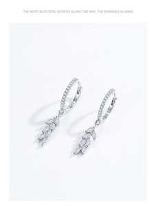 Detail of S925 sterling silver leaf earring featuring micro-pave crystals and S925 hallmark