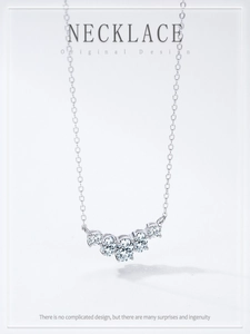Macro detail of S925 sterling silver necklace with five sparkling geometric zircons
