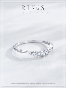 Macro detail of S925 silver ring featuring seven gradient pavé-set round cubic zirconia