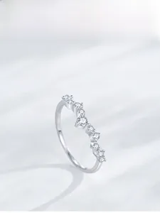 Detailed view of the S925 sterling silver wave ring with sparkling cubic zirconia stones