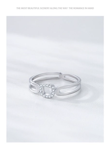 Detailed macro view of S925 sterling silver double-layer hollow ring with square zircons