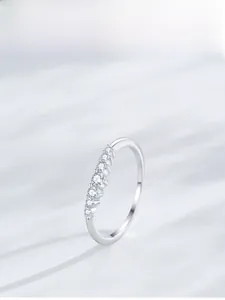 Close-up of S925 sterling silver ring with seven sparkling round-cut cubic zirconia stones