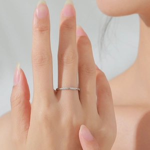Minimalist S925 sterling silver twisted ring with shimmering cubic zirconia accents