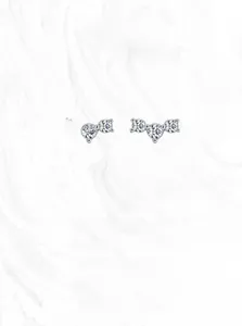 Close-up of S925 sterling silver studs with three curved sparkling zircon stones