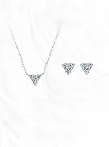 Detail showing S925 silver triangle necklace and stud earrings set with white zircons