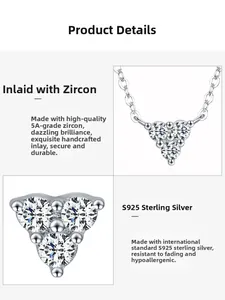 Macro detail of S925 sterling silver necklace with three triangular zircon stones
