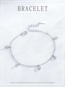 Detailed shot of S925 silver bracelet with five round cubic zirconia and lobster clasp