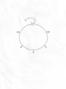 Close-up of S925 sterling silver bracelet with five sparkling cubic zirconia stones