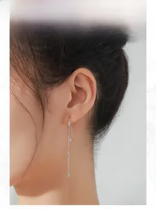 Elegant S925 sterling silver long tassel threader earrings with zircon on female model