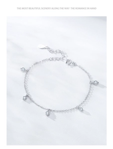 Detail of S925 silver bracelet with zircon charms and adjustable lobster clasp extension
