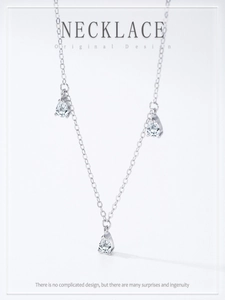 Detailed view of three teardrop-shaped zircon pendants on an S925 sterling silver chain