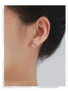 Detailed view of S925 sterling silver hoop earrings with delicate hanging chain drops