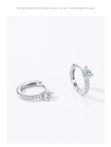 Detailed view of S925 silver hoop earrings with pear-shaped zircon and pavé setting