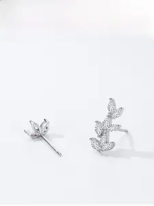 Detailed close-up of S925 sterling silver leaf earrings with sparkling zircon stones