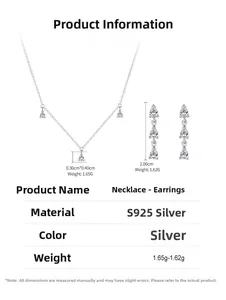 Detail showing S925 sterling silver drop pendant and earrings with cubic zirconia stones