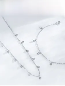 Detail showing the elegant S925 sterling silver chain with small round cubic zirconia stones