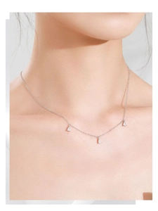 Close-up of S925 sterling silver necklace with three sparkling teardrop zircon pendants