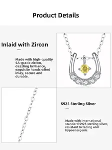 Détail macro du pendentif fer à cheval en argent S925 avec une pierre zircon jaune